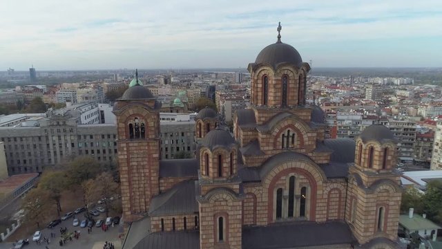 An HD aerial shot showing downtown, national parliament, St Marco church and a park in Belgrade on a nice sunny day.