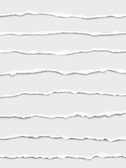 Fototapeta premium Oblong torn white paper wisps placed one under another with soft shadow. Vector paper mock up.