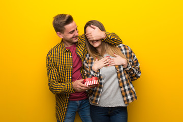 Couple in valentine day holding gift box