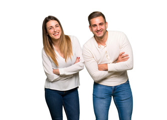 Couple in valentine day keeping the arms crossed while smiling