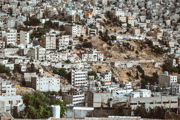 View of houses on hills in the center of Amman, the capital of Jordan