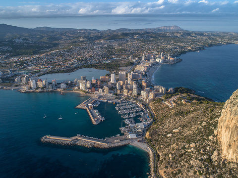 Aerial photo of costal town with view point from the Peñon de Ifach. Prety summer sunset. Calpe, Alicante province, Spain 3