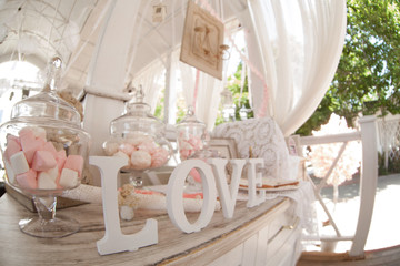 Candy bar. Marshmallows, sweets, concept of a festive table, buffet.