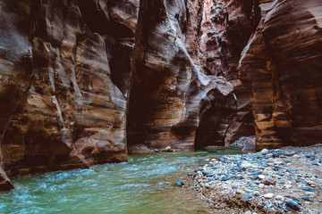 River canyon of Wadi Mujib in amazing golden light colors. Wadi Mujib is located in area of Dead Sea in Jordan