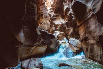 Beautiful canyon in Jordan territory called Wadi Mujib. five kilometers of canyoning trail arounded by hundreds meters of rocky walls - obrazy, fototapety, plakaty