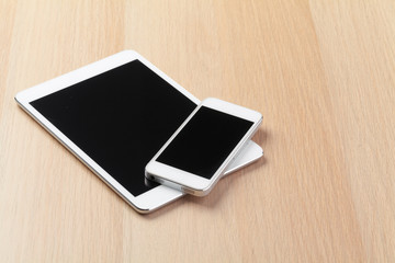 digital tablet and smartphone on the table