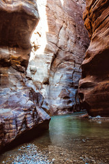 River canyon of Wadi Mujib in amazing golden light colors. Wadi Mujib is located in area of Dead Sea in Jordan