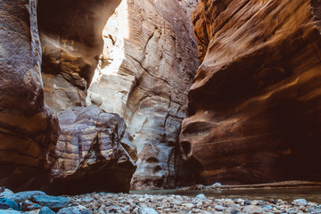 River canyon of Wadi Mujib in amazing golden light colors. Wadi Mujib is located in area of Dead Sea in Jordan