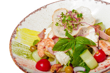 Fresh salad plate with shrimp, tomato and mixed greens