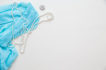 Top view Blue fabric fashion and pearl
