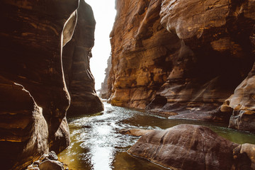 River canyon of Wadi Mujib in amazing golden light colors. Wadi Mujib is located in area of Dead Sea in Jordan