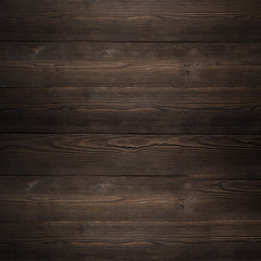 The texture of the wooden Board dark brown old house