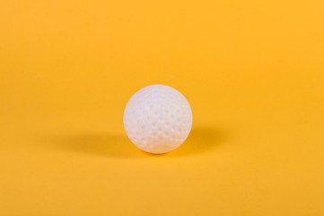  golf ball on yellow background