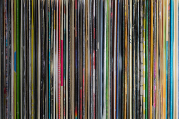 Stack of old vinyl records background