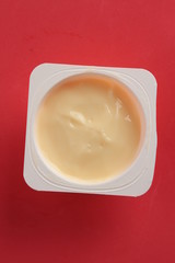 custard packed in plastic container