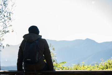 Men traveller going alone in the wild