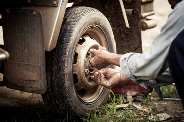 Old man changed tires.