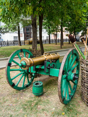 Ancient cannon, firing iron cores. Old weapon on historical festival Times and Epochs. Moscow, Russia.