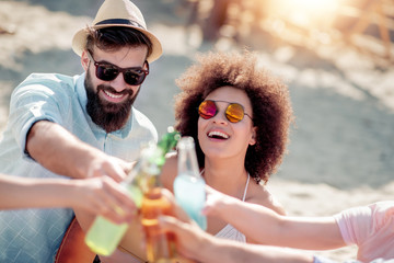 Friends having fun together on the beach