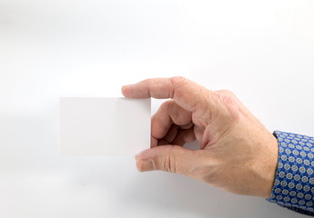 Obraz premium Hand holding blank plain white business card design