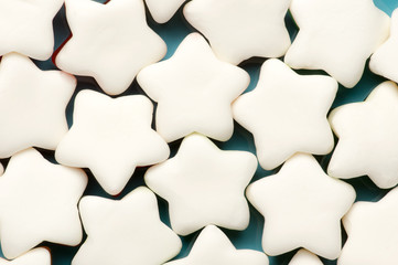  white stars on a blue background, marshmallows, background,flat lay.