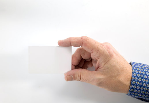 Hand holding blank plain white business card design