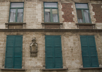 Fototapeta na wymiar European windows and shutters