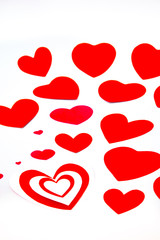 Red hearts on white background