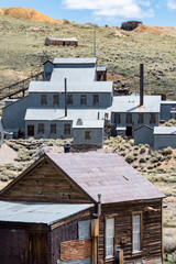 Buildings in the abandoned ghost town of Bodie California. Bodie was a busy, high elevation gold mining town in the Sierra Nevada Mountains in the early 1900s