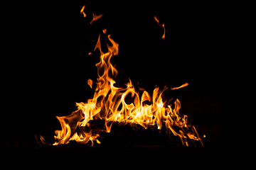 Fire flames burning isolated on black background. High resolution wood fire flames collection smoke texture background concept image.