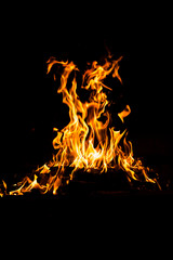 Fire flames burning isolated on black background. High resolution wood fire flames collection smoke texture background concept image.