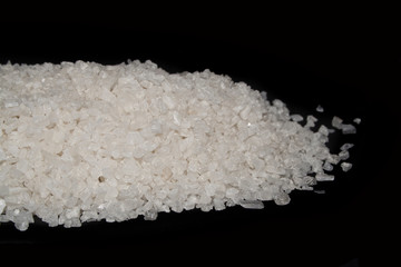 salt isolated on black background