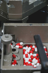 Drugs in Pharmaceutical machine close up