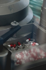 Drugs in Pharmaceutical machine close up