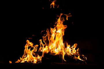 Fire flames burning isolated on black background. High resolution wood fire flames collection smoke...
