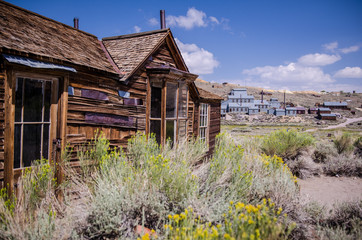 Buildings in the abandoned ghost town of Bodie California. Bodie was a busy, high elevation gold mining town in the Sierra Nevada Mountains in the early 1900s