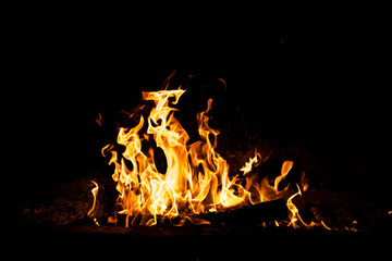 Fire flames burning isolated on black background. High resolution wood fire flames collection smoke texture background concept image.