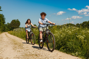 Urban biking - kids riding bikes 
