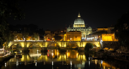 Naklejka na ściany i meble Vatican City: Saint Peter with bridge reflection by night