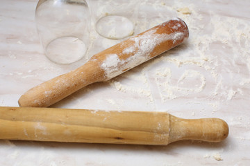 rolling pin and flour on the table