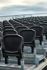 Obraz premium Empty black tribune seats