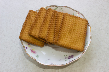 Yellow cookies on a plate
