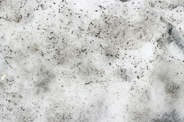 Snow dirty grimy stained texture surface close up