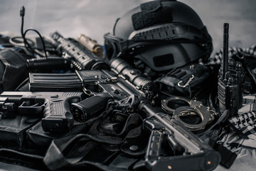 Fototapeta premium military equipman and weapons close up shooting