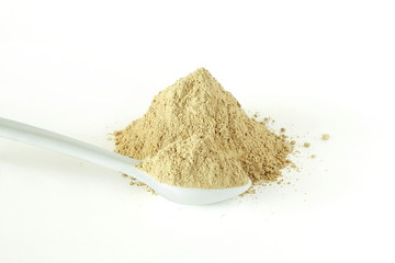 ground white pepper powder spice isolated in white background