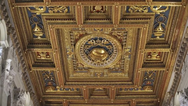 Amazing golden dome of temple. Architecture design of old Archbasilica of St. John Lateran in Rome. Sculptures. Details, art. Religious concept. Inside, indoors. richy decorated