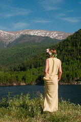 young woman in the mountains