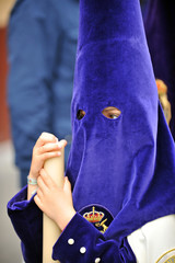 Nazarene eyes of the brotherhood of the Our Lady of Hope (Esperanza) of Triana. Procession of Holy Week (Semana Santa) in Seville. 