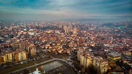 Fototapeta na wymiar Aerial view of sunset in a city in winter. Kragujevac in Serbia.