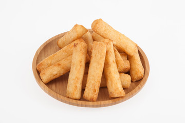 Fototapeta na wymiar tasty fried yucca sticks on white background